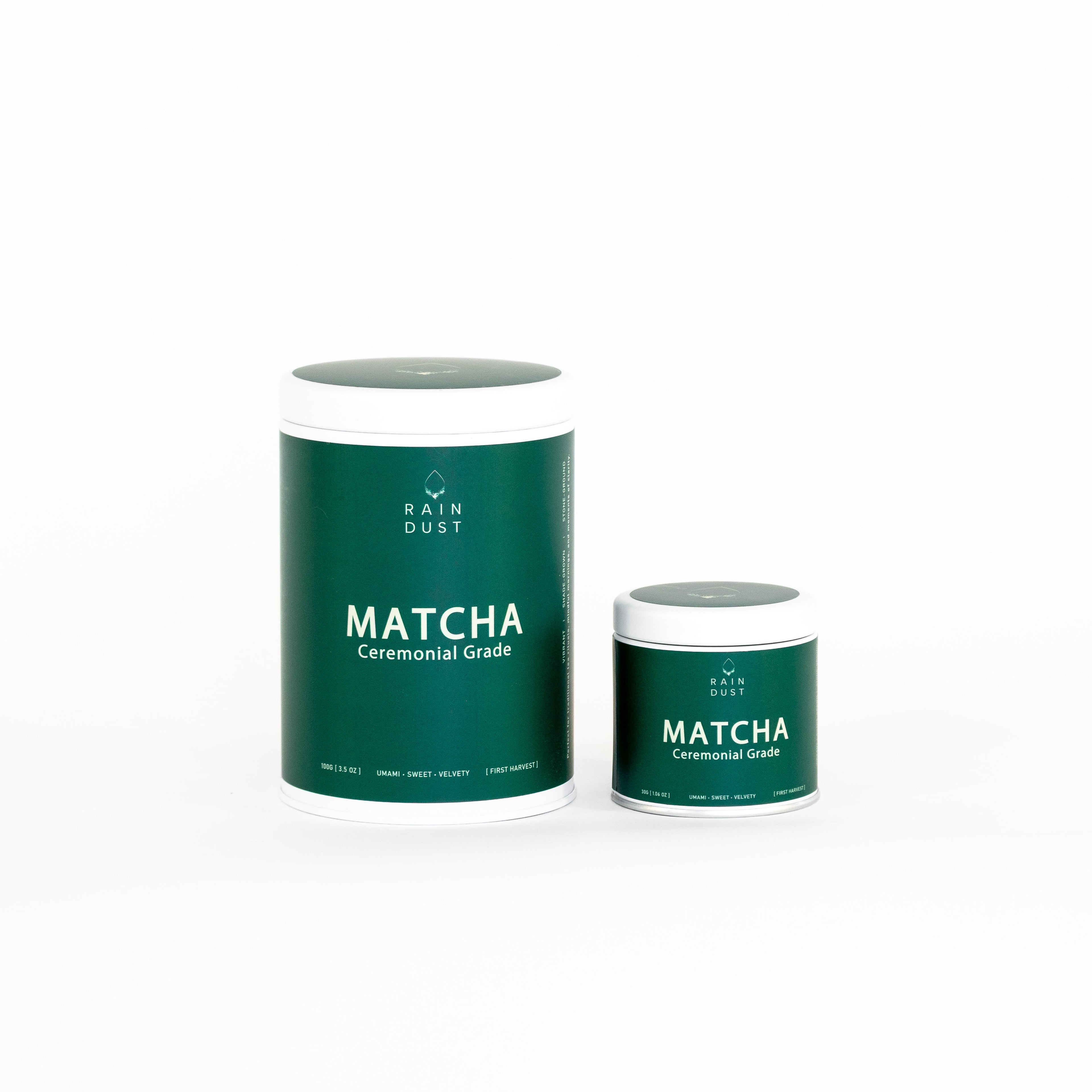 Two rain dust ceremonial grade matcha containers on a white background
