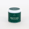 Close-up of premium matcha powder, vibrant green Japanese tea with smooth texture and rich umami aroma.