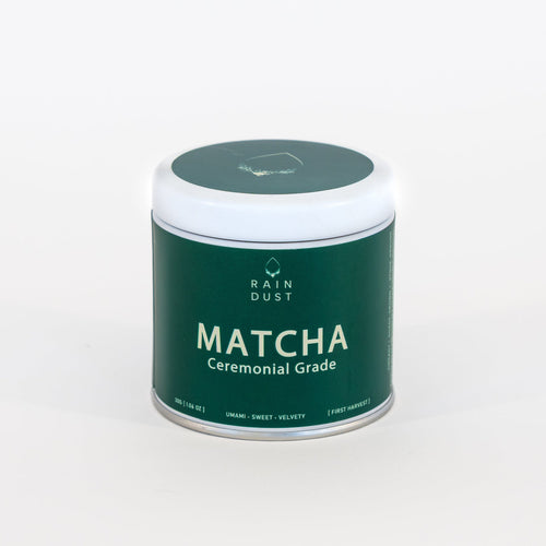 Rain Dust Rich Umami ceremonial grade Japanese matcha powder in a premium tea tin.