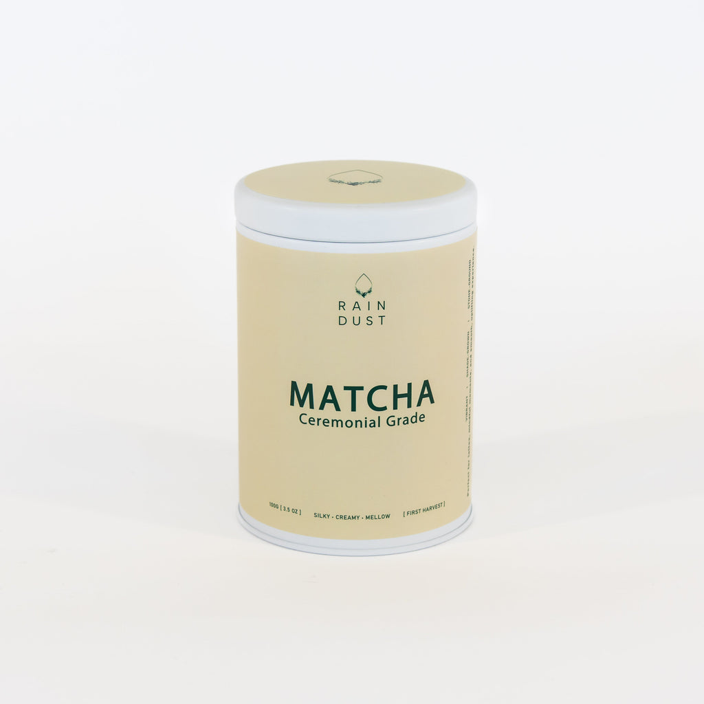 100 gram rain dust smooth and creamy Matcha container on a white background 