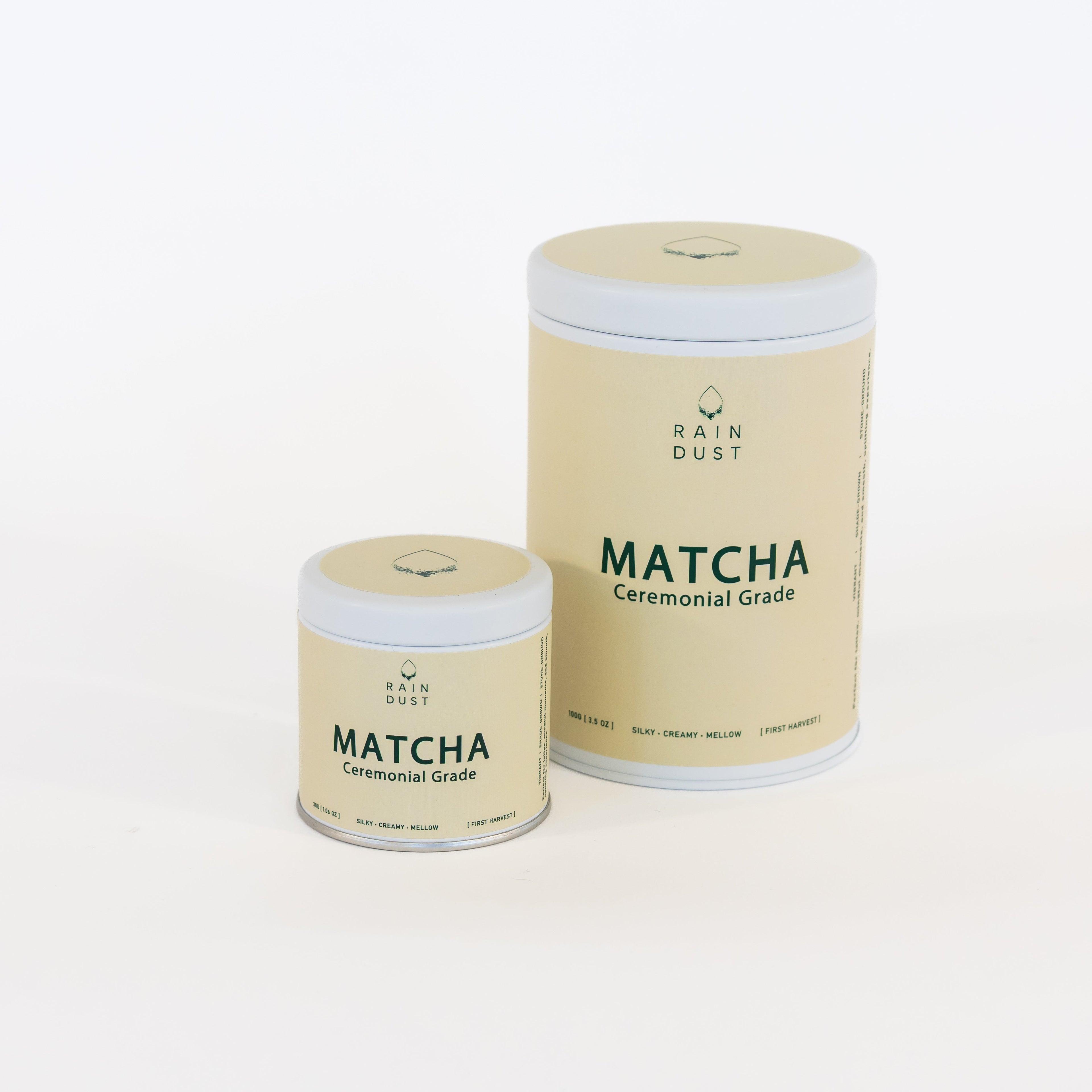 2 containers rain dust smooth and creamy Matcha on a white background