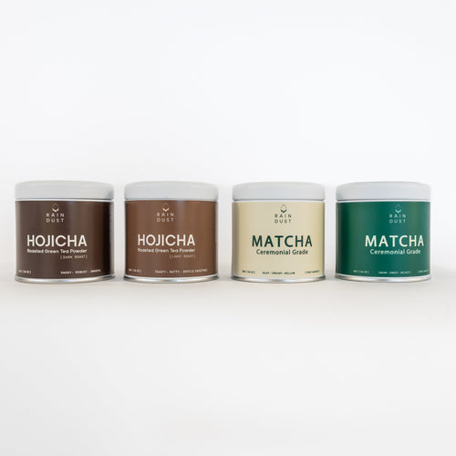 Four containers of different types of green tea powder on a white background