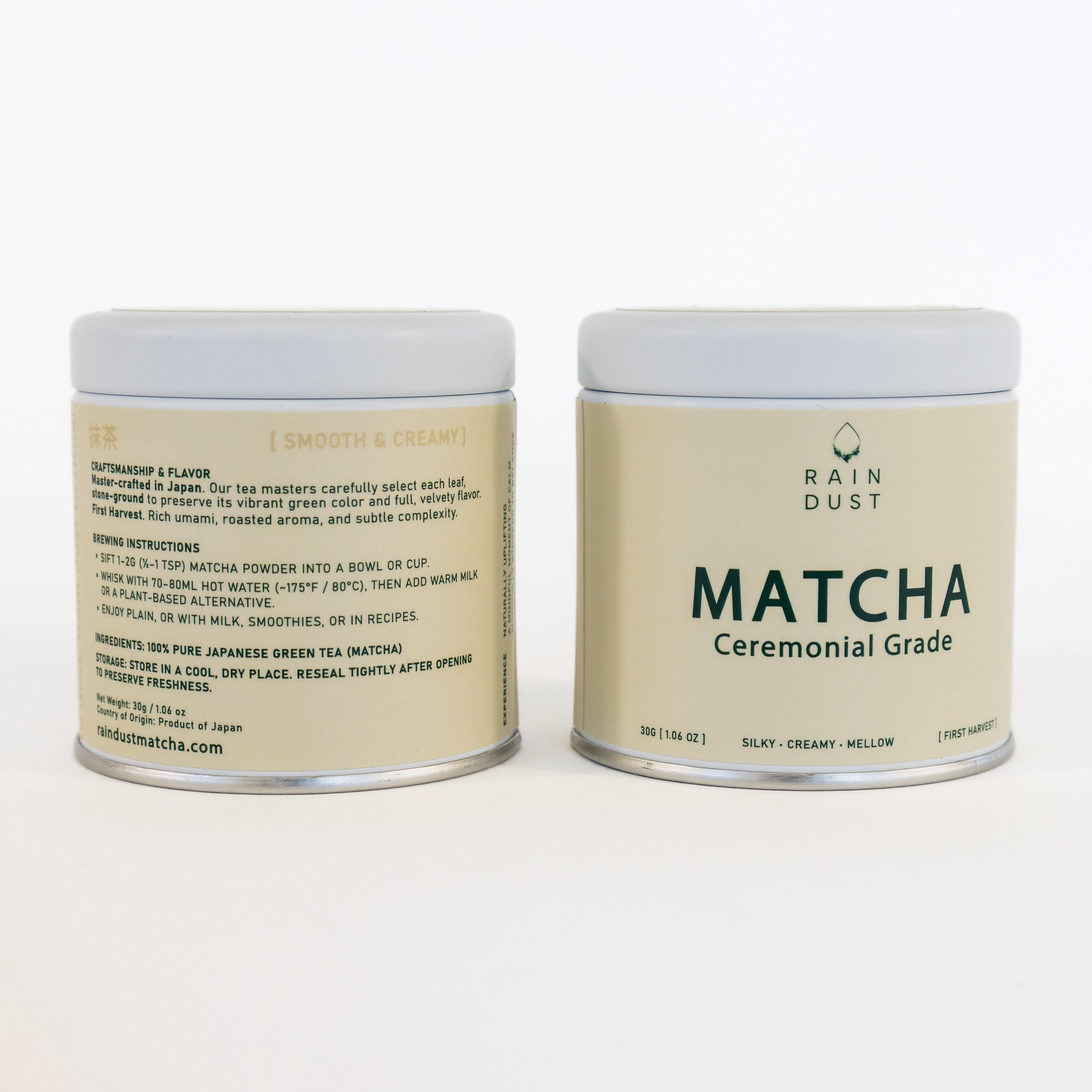 Two cans of Rain Dust Matcha Ceremonial Grade on a white background